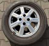 Alu kolo originál CHEVROLET 4.5x14" ET43.5 4x100x56.5 a Goodride Radial SP06 175/65 R14 82H 40% 